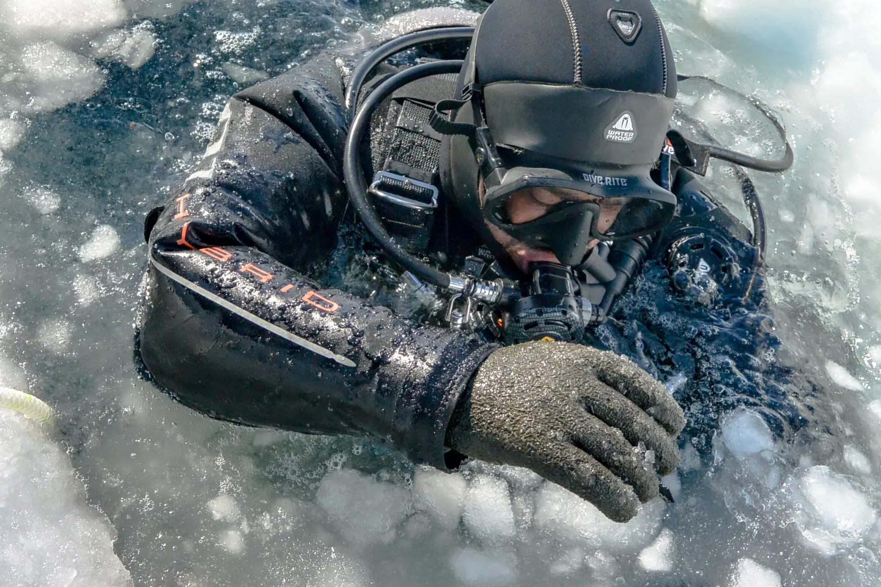 Dry-suit diver at the ice surface